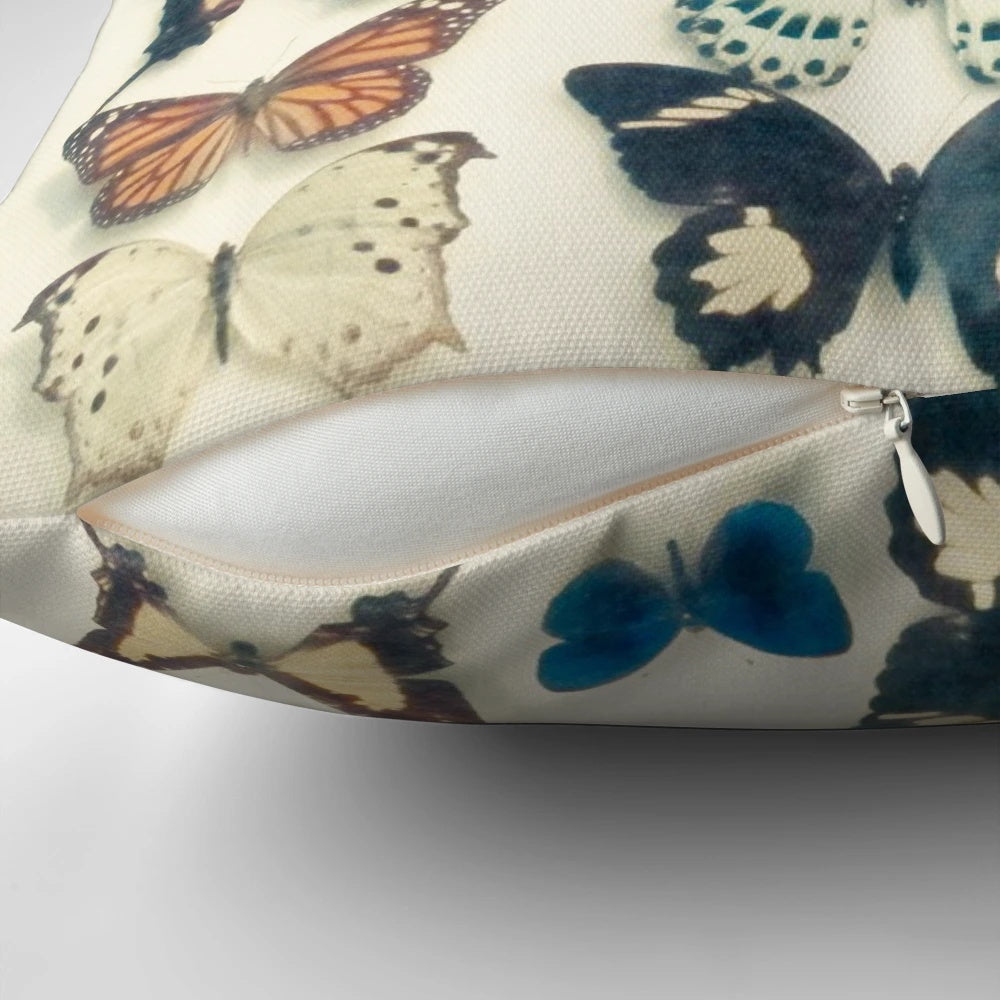 Colorful butterfly wings-inspired decorative pillow with a bold, textured design