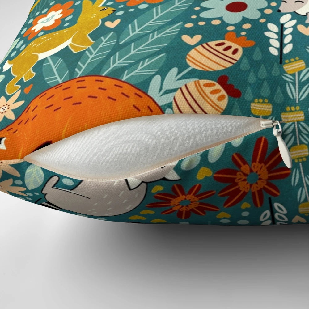 Decorative throw pillow featuring a whimsical woodland pattern with forest animals and floral elements, digitally illustrated in a hand-drawn style.
