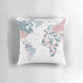 A decorative throw pillow featuring a detailed map of the world in soft pink and blue colors.