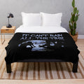 Soft, cozy blue plush blanket with crow motif design