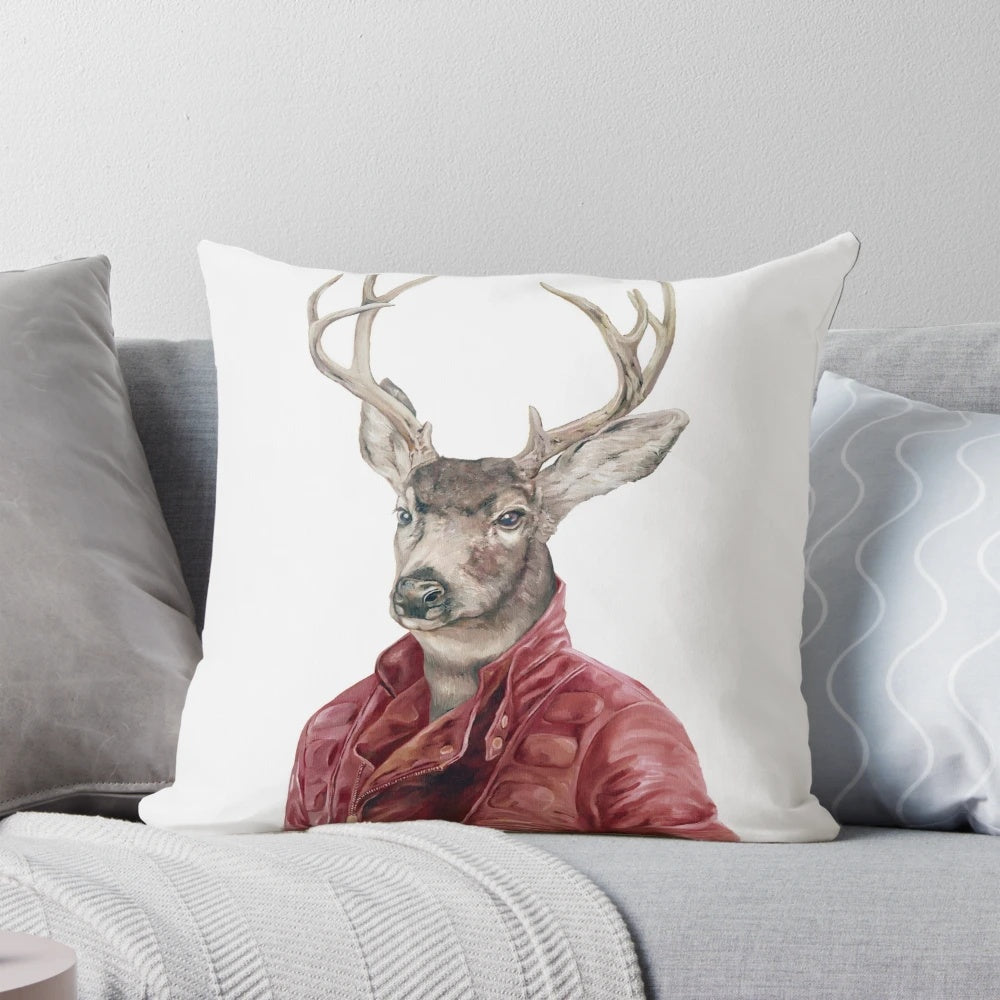 Artistic pillow featuring a deer illustration with leather accents for a cozy, Scandinavian-inspired look.