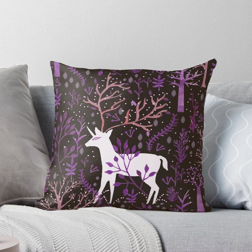 Whimsical deericorn illustration in a purple pillow design