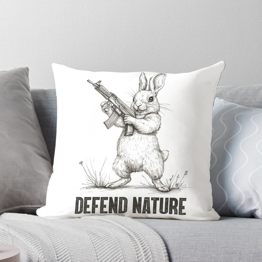 Rabbit-shaped pillow with the text "Defend Nature" on a forest background