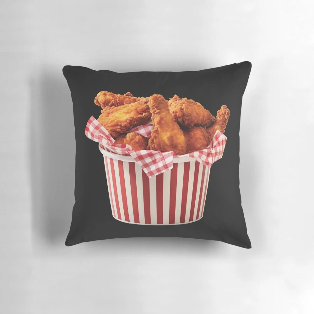 A realistic-looking fried chicken bucket pillow with crispy, golden-brown chicken pieces.