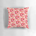 Vibrant strawberry donut pattern printed on a soft, plush pillow for stylish home accents