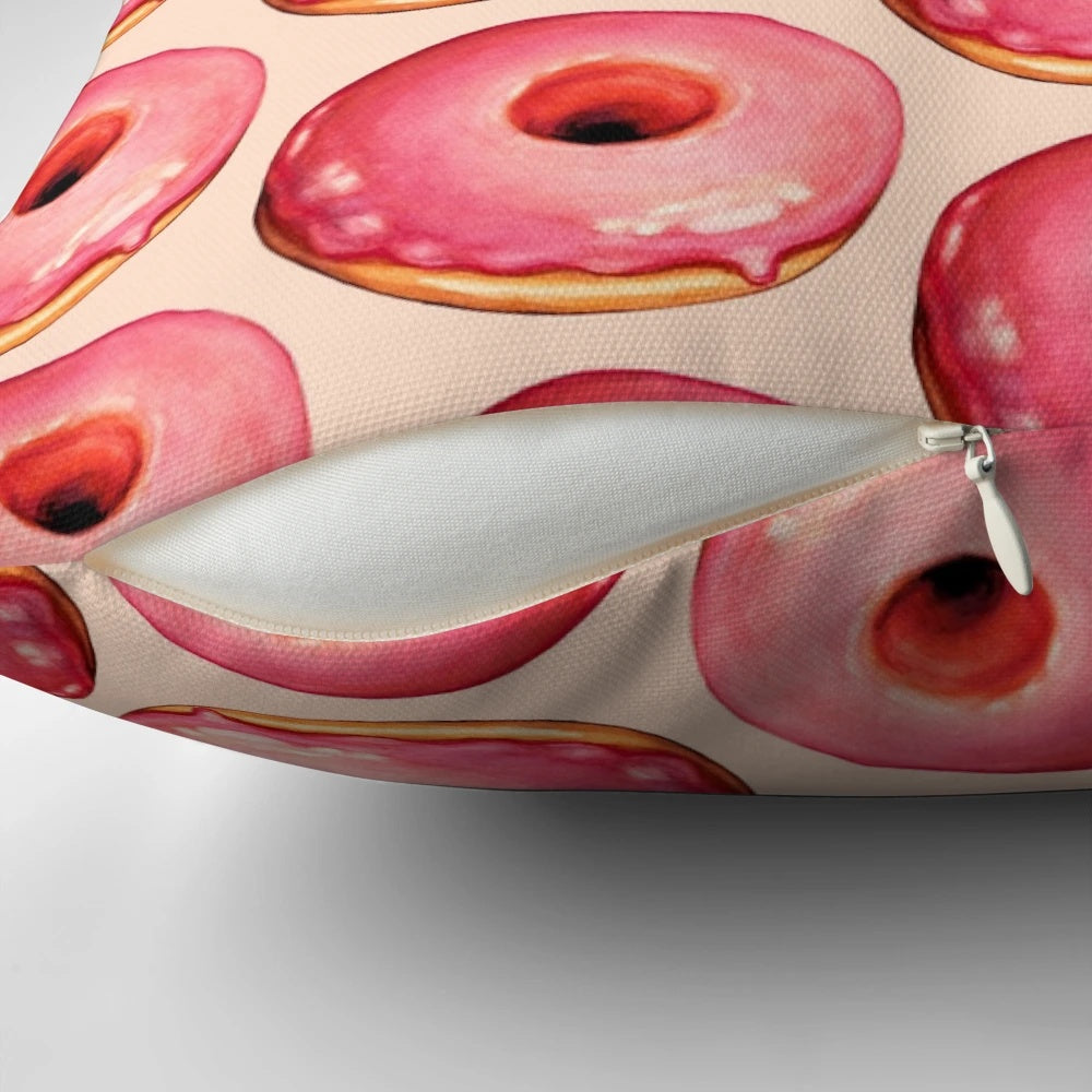 Vibrant strawberry donut pattern printed on a soft, plush pillow for stylish home accents