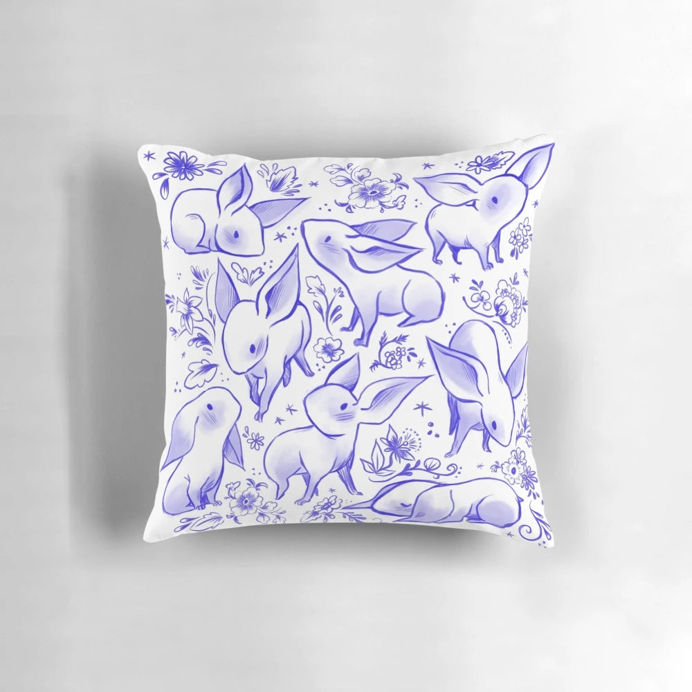 Delft-style dragon age nugs design printed on a soft, comfortable pillow