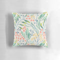 Botanical garden-inspired floral pillow with a delicate watercolor design