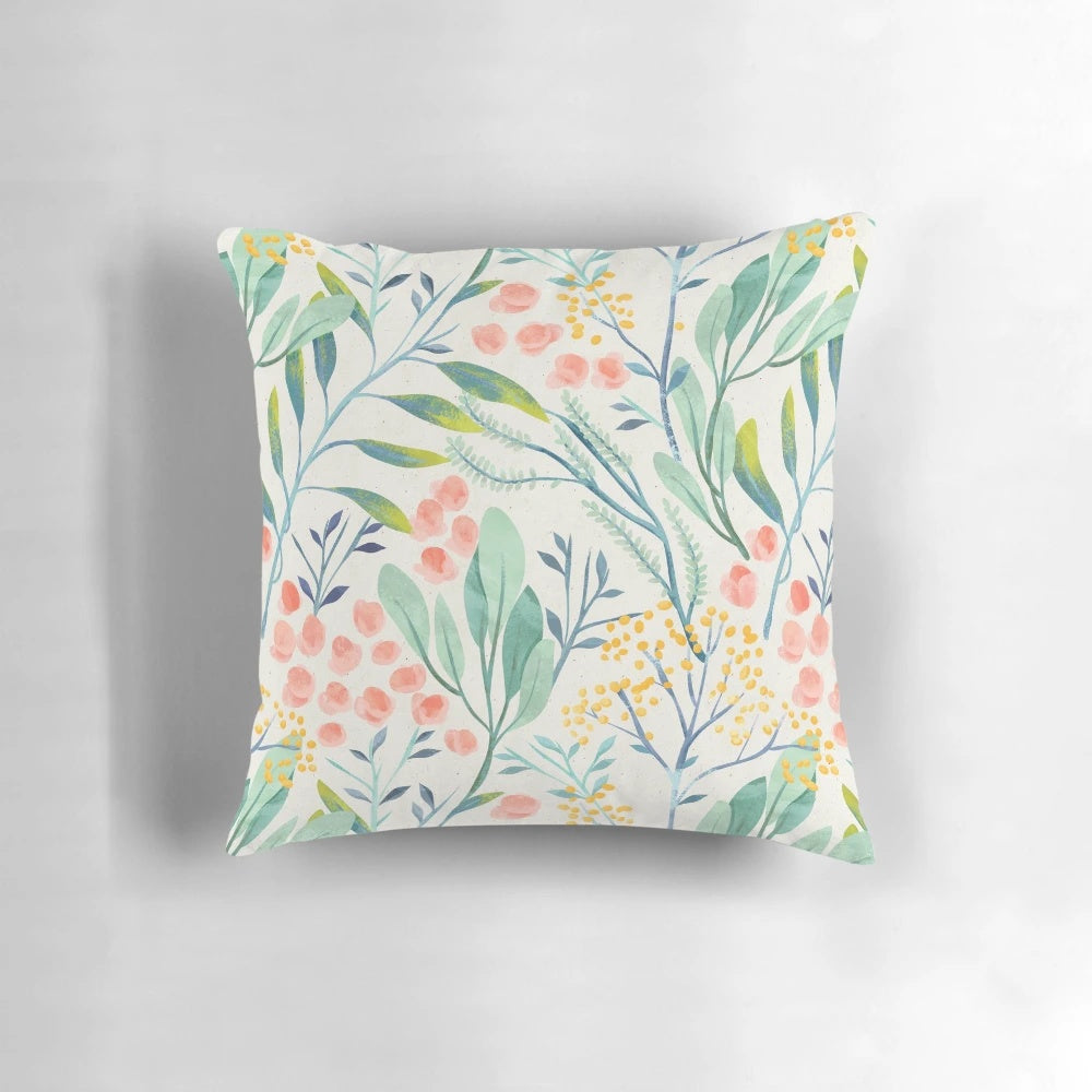 Botanical garden-inspired floral pillow with a delicate watercolor design