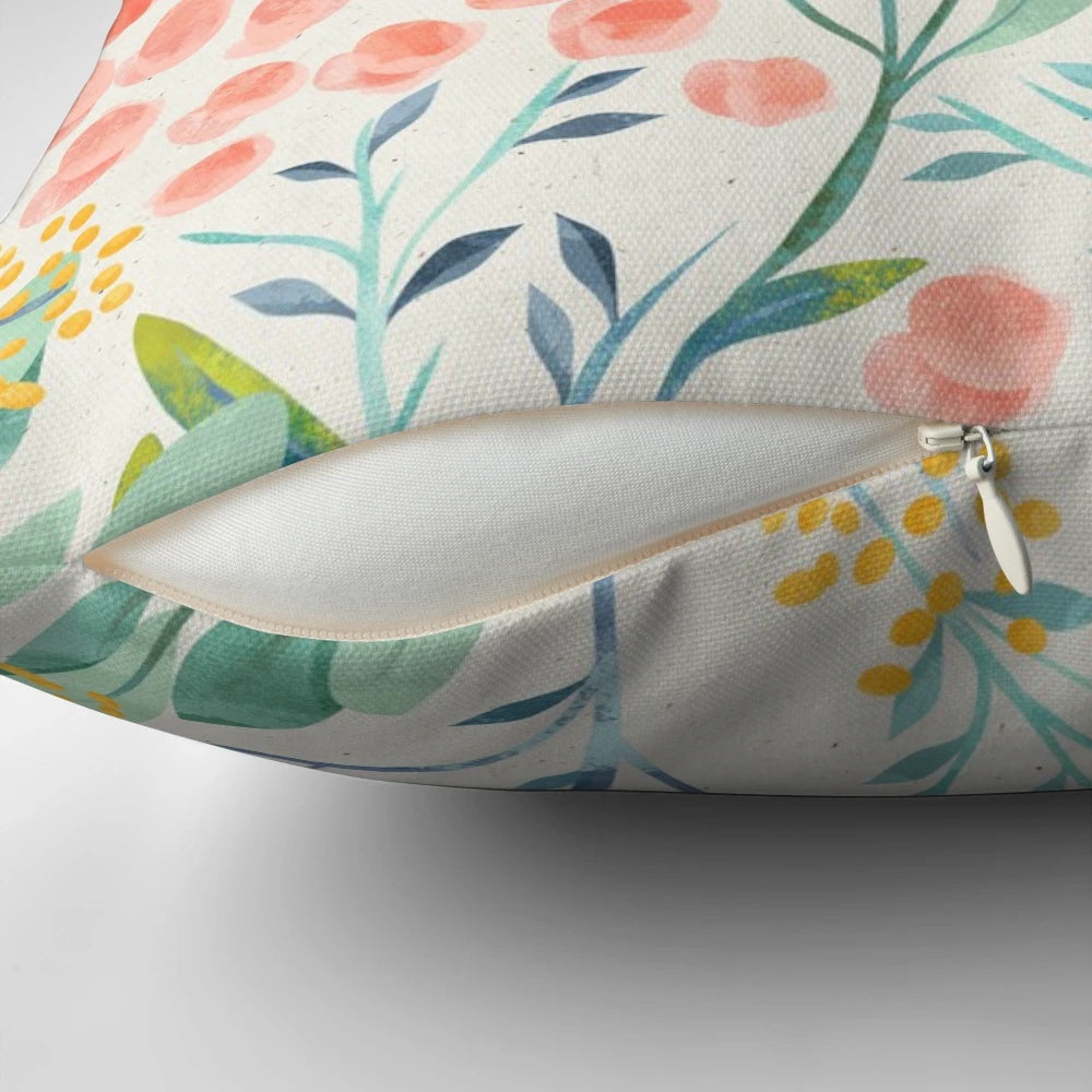 Botanical garden-inspired floral pillow with a delicate watercolor design