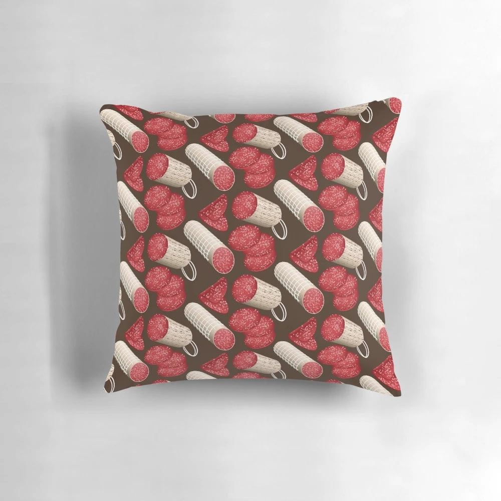 A soft, comfortable pillow featuring a vibrant salami pattern, perfect for food enthusiasts.