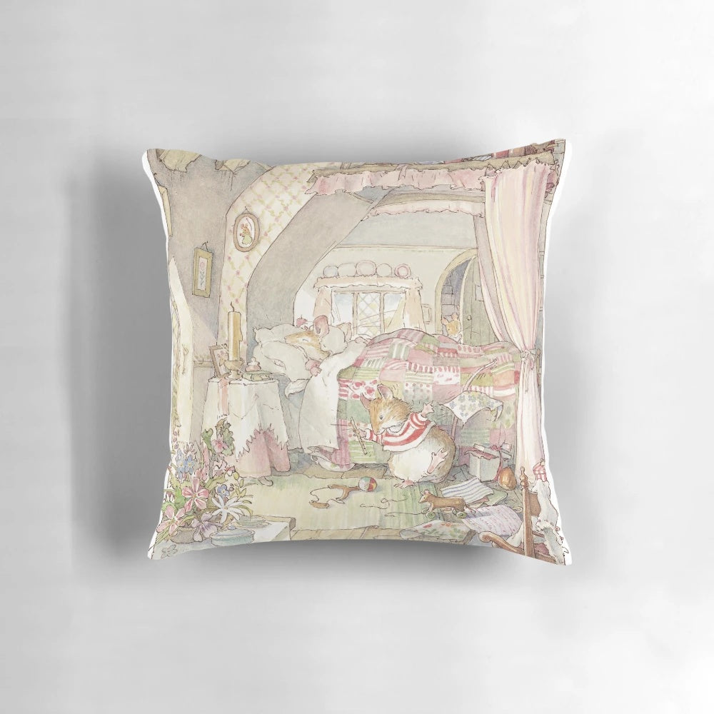 A colorful pillow featuring a Brambly Hedge-inspired birthday scene with mice, trees, and hawthorn blossom.