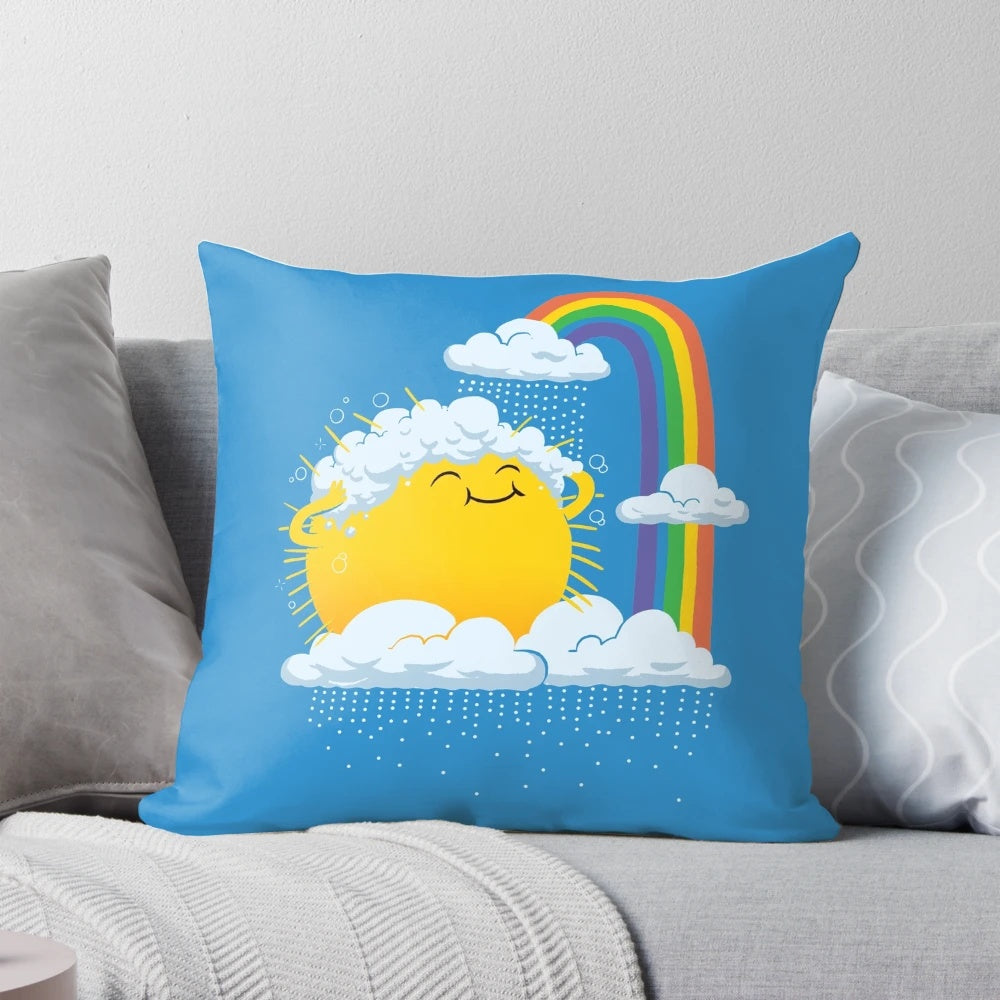 Whimsical illustration of a rainy day scene with a smiling sun, rainbow, and raindrops on a decorative kids pillow