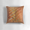 A cozy and whimsical pillow designed with a Greggs steak bake pattern, perfect for celebrating British cuisine.