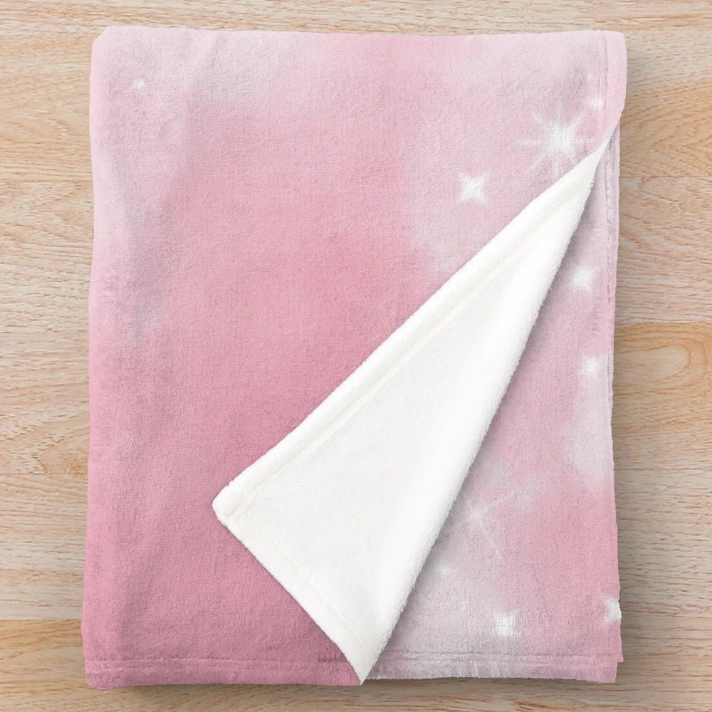 Soft and luxurious plush blanket with a whimsical pink cloud and sparkle design