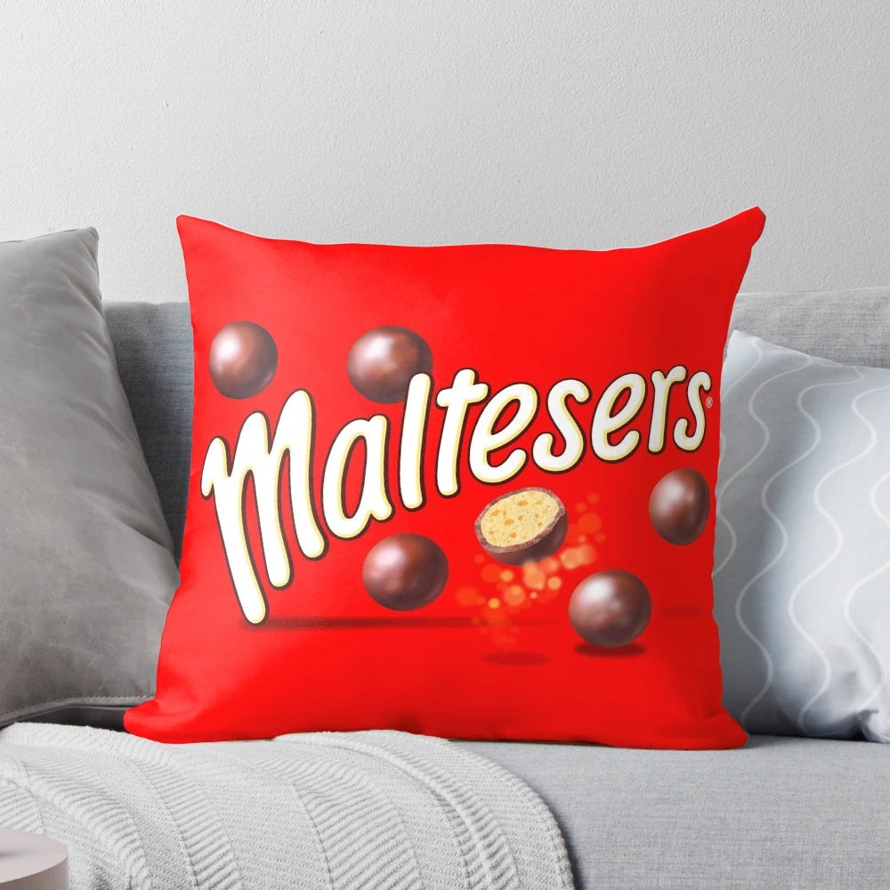 Soft, plush pillow in the shape of Malteasers chocolate candies