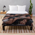 Destiel-inspired plush blanket featuring Dean Winchester and Castiel cuddling