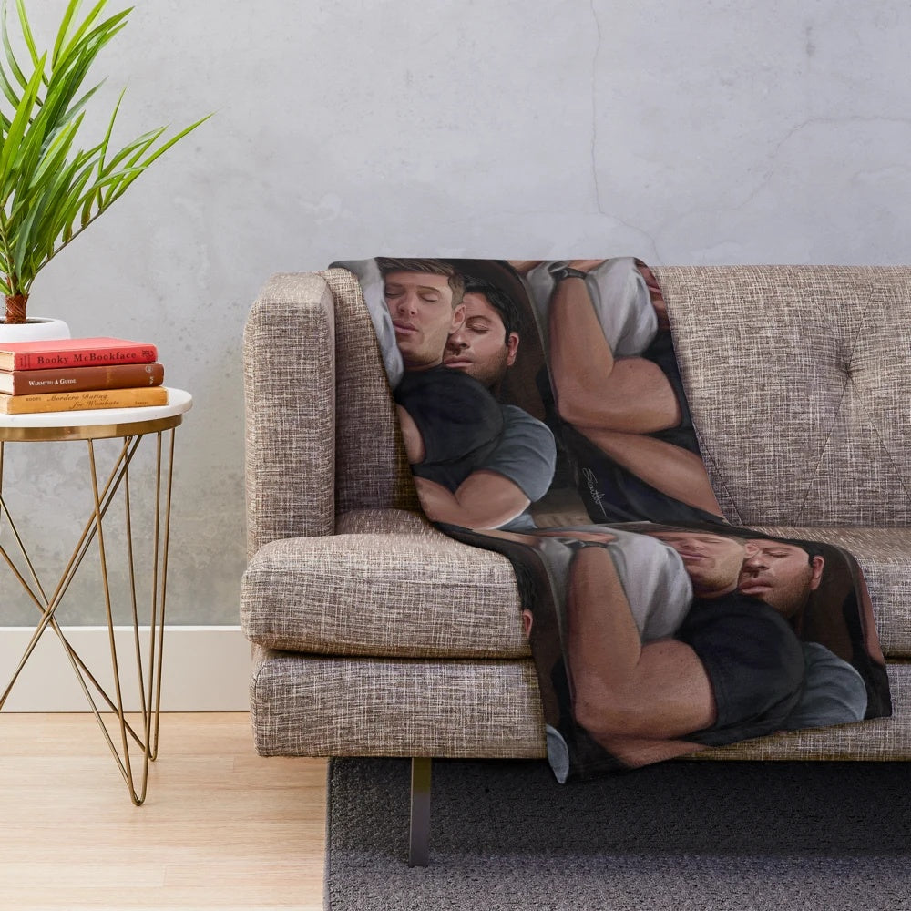 Destiel-inspired plush blanket featuring Dean Winchester and Castiel cuddling