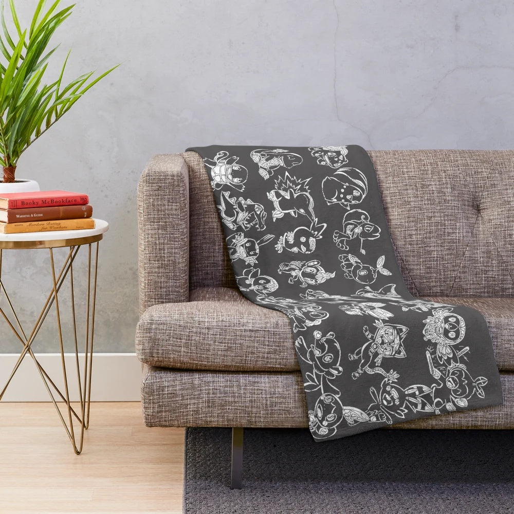Detailed black and white plush blanket featuring Pokemon-inspired creatures