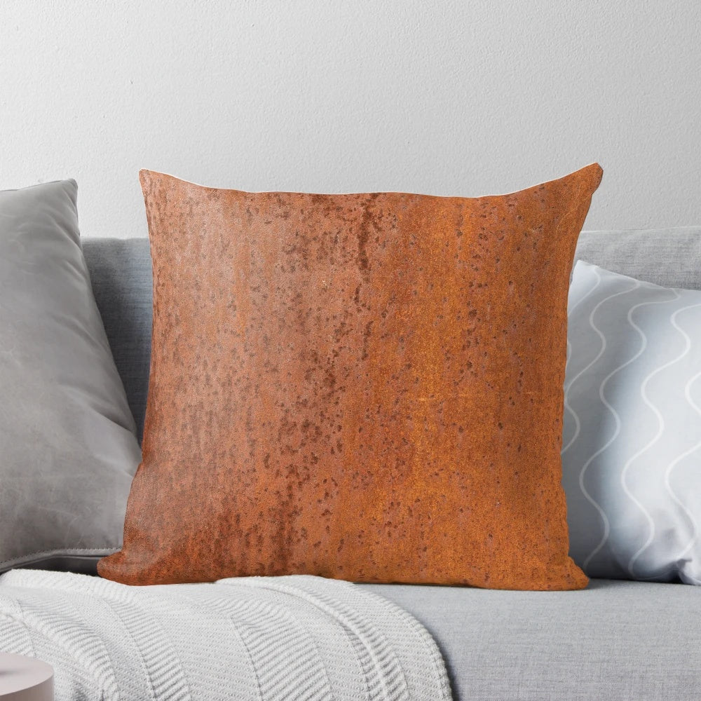 Detailed closeup of a slightly rough, weathered and rusted orange-red metal sheet texture, perfect for a pillow design.