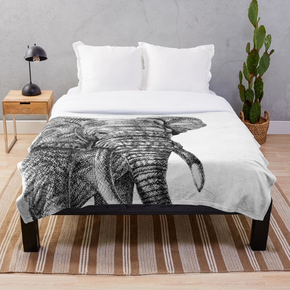 Realistic ink drawing of an elephant on a plush blanket