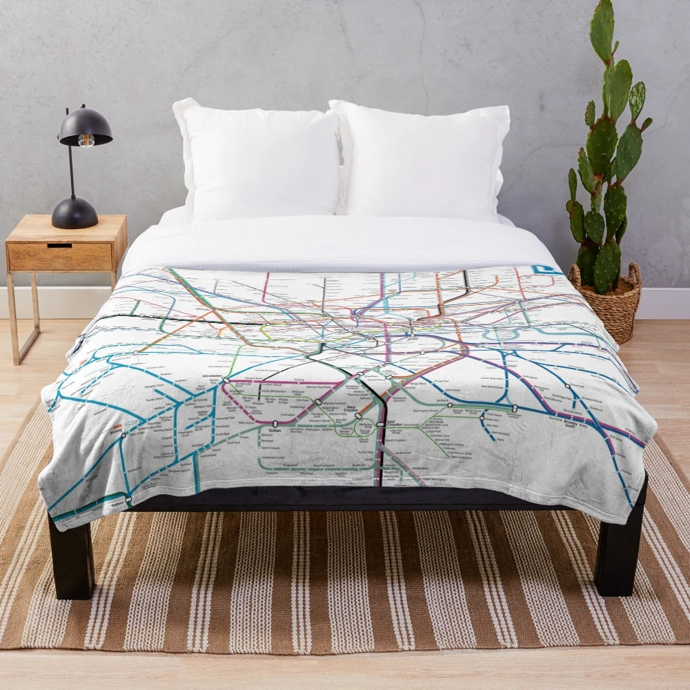 Plush blanket featuring a detailed map of the London underground, overground, and rail network