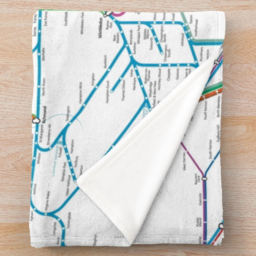 Plush blanket featuring a detailed map of the London underground, overground, and rail network