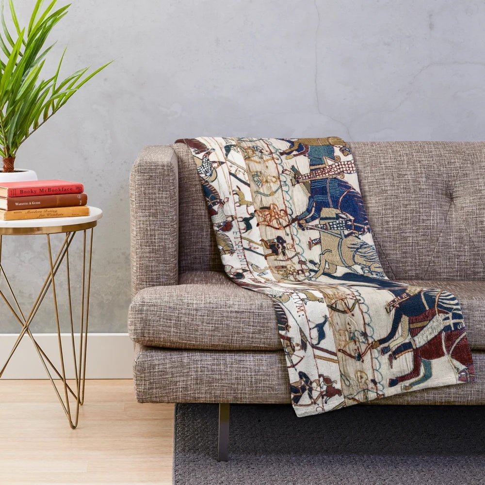 Detailed plush blanket with image of norman knights and archers from the Bayeux Tapestry