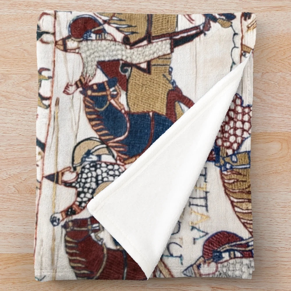 Detailed plush blanket with image of norman knights and archers from the Bayeux Tapestry