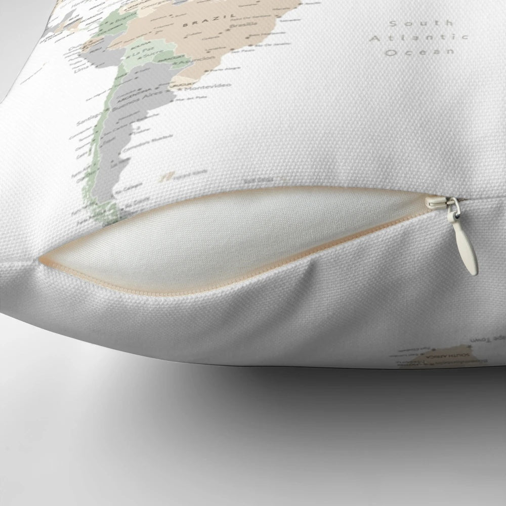 Detailed world map with cities printed on a green and gray pillow, perfect for modern home, nursery, or travel-themed decor.