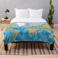 Detailed world map printed on a large, soft plush blanket for homeschooling and geography learning