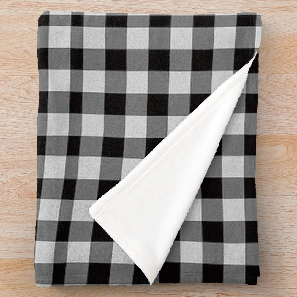 Diagonal plaid pattern plush blanket with Scottish tartan design