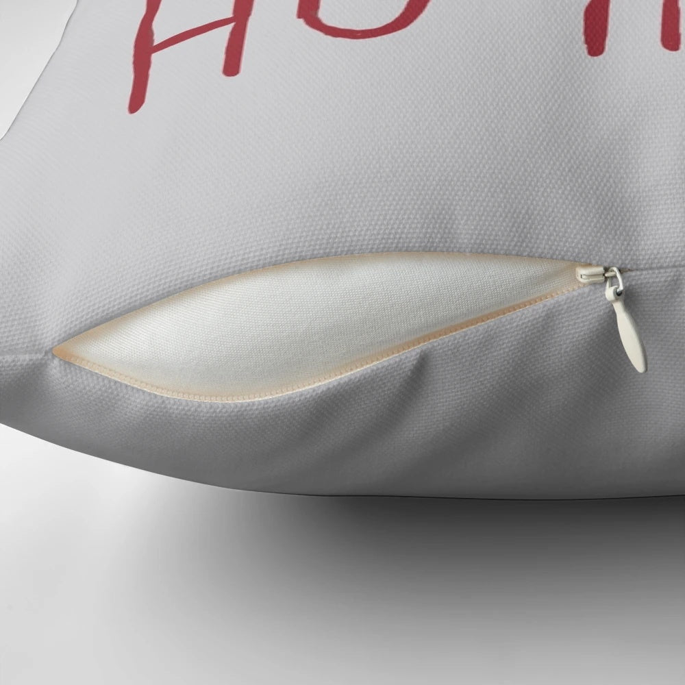 Die Hard-themed Christmas pillow featuring Bruce Willis' iconic "Ho Ho Ho" quote