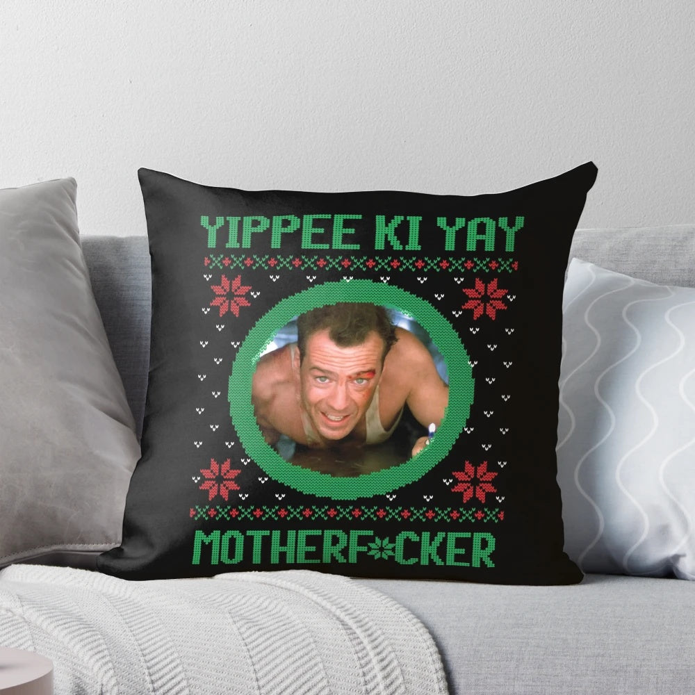 A plush pillow featuring the iconic "Yippee Ki Yay, Motherf*cker!" quote from the classic Christmas action movie, Die Hard.