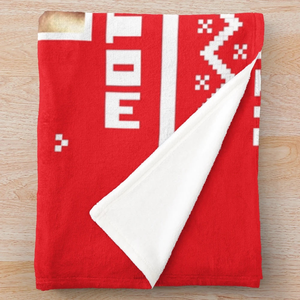 Die Hard-inspired plush blanket with "Yippee Ki Yay" text