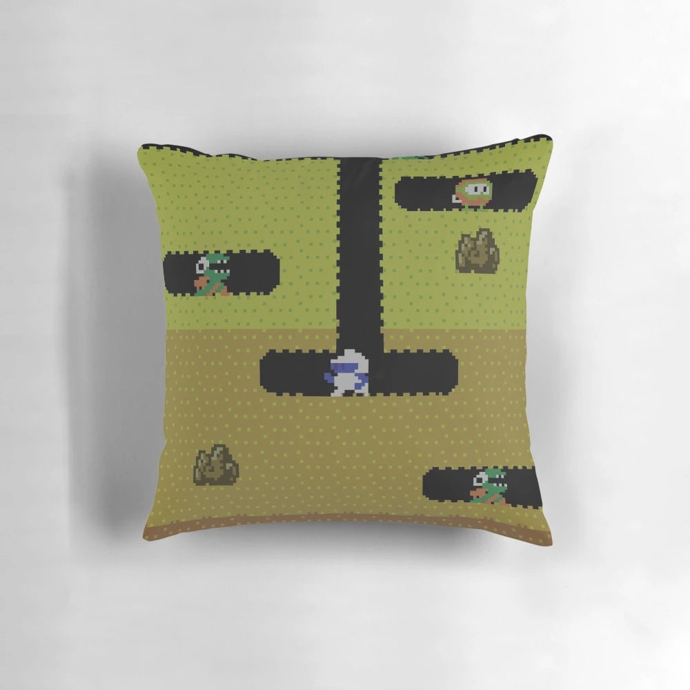 Vibrant Dig Dug-inspired pillow with iconic pixel art design, perfect for retro gaming enthusiasts