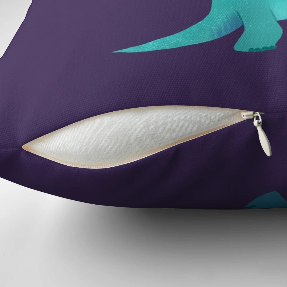 A soft, plush pillow featuring a dinosaur and book design, perfect for kids' rooms.