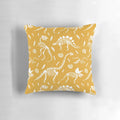 Mustard yellow pillow with dinosaur fossil design, ideal for dinosaur enthusiasts and paleontology fans.