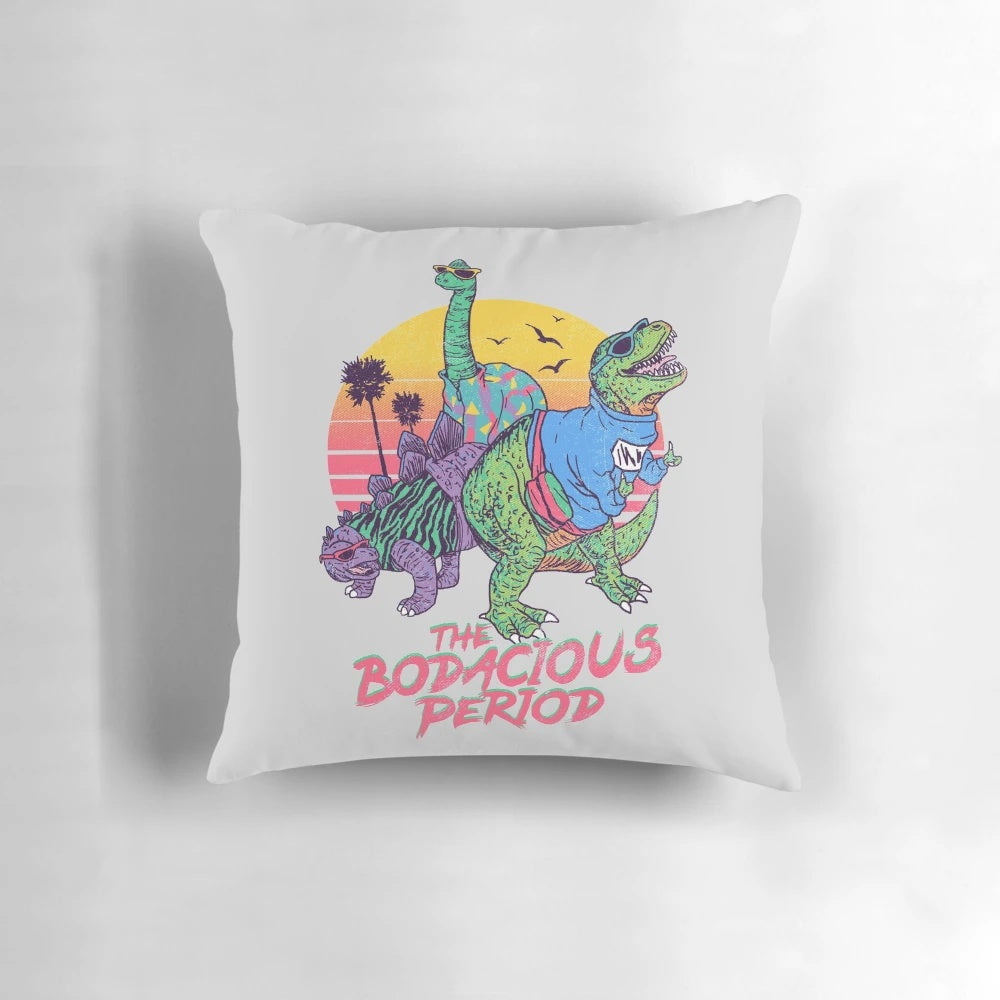 Vibrant dinosaur print period pillow in retro 80s style