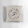 Pillow featuring a hand-drawn illustration of a dinosaur skull fossil, including a tyrannosaurus rex bone structure and rose quartz mineral.