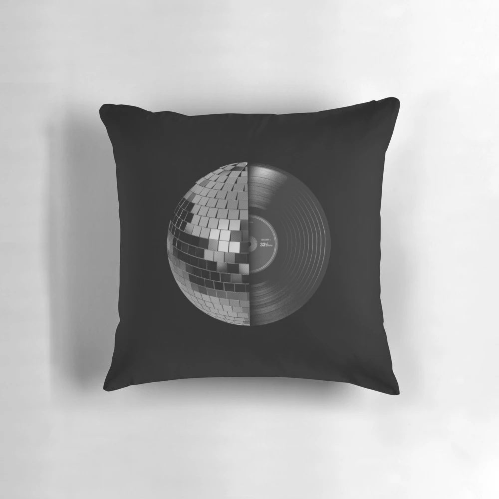 A decorative disco ball pillow with a mirrored sphere design for a retro, music-inspired home decor accent.
