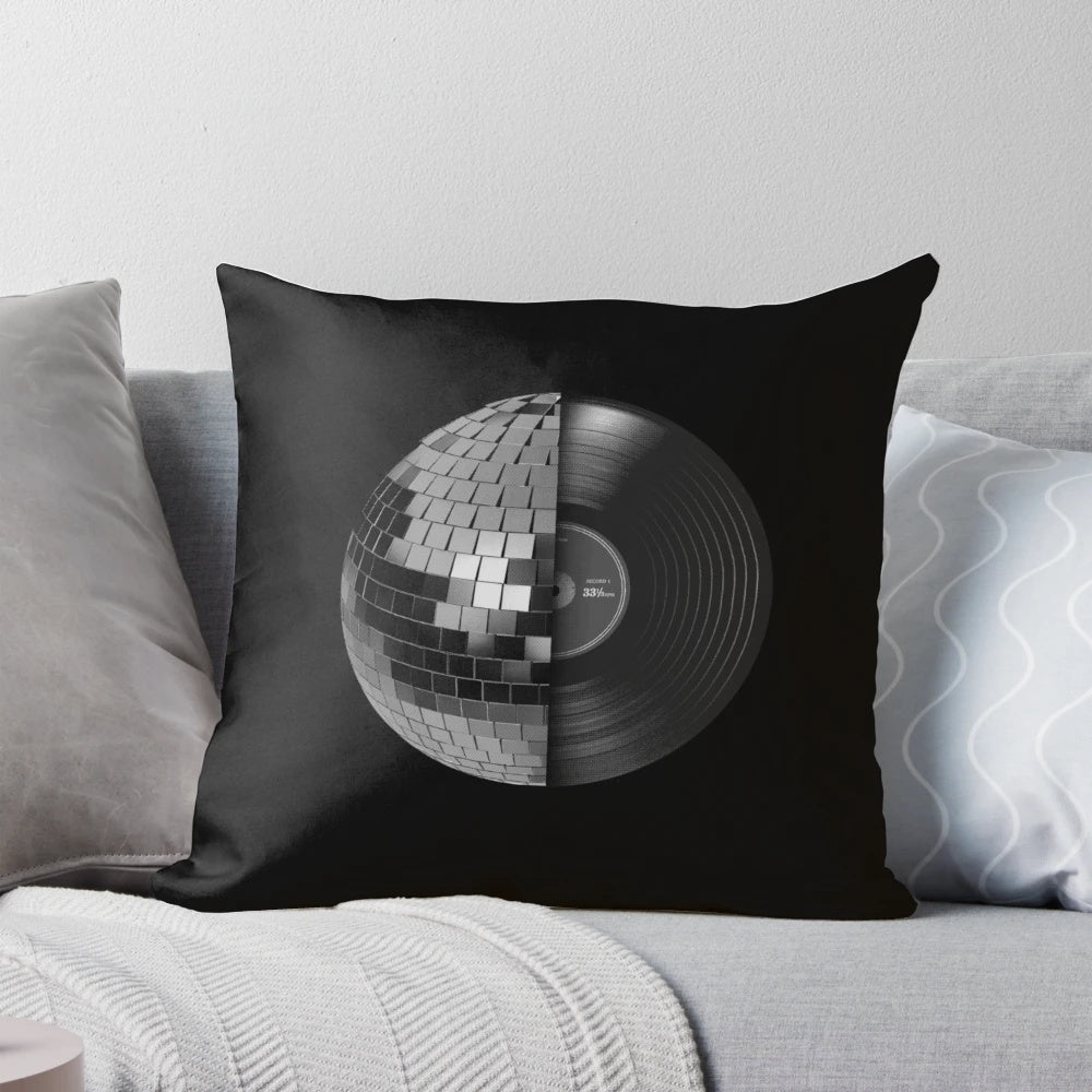 A decorative disco ball pillow with a mirrored sphere design for a retro, music-inspired home decor accent.