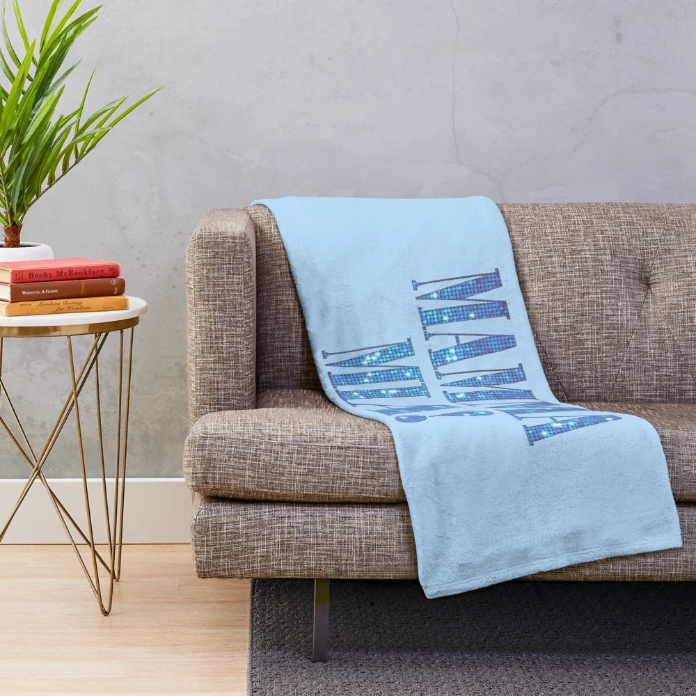 Mamma Mia plush blanket with disco-inspired design