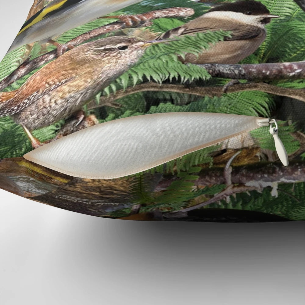 A cozy pillow featuring a vibrant design of various British birds, including owls, hawks, and more.