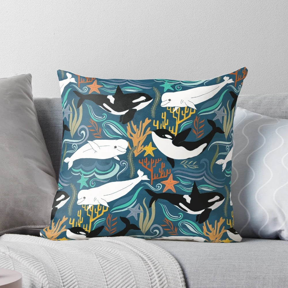 Soft, plush pillow featuring a beautiful illustration of whales swimming in the ocean
