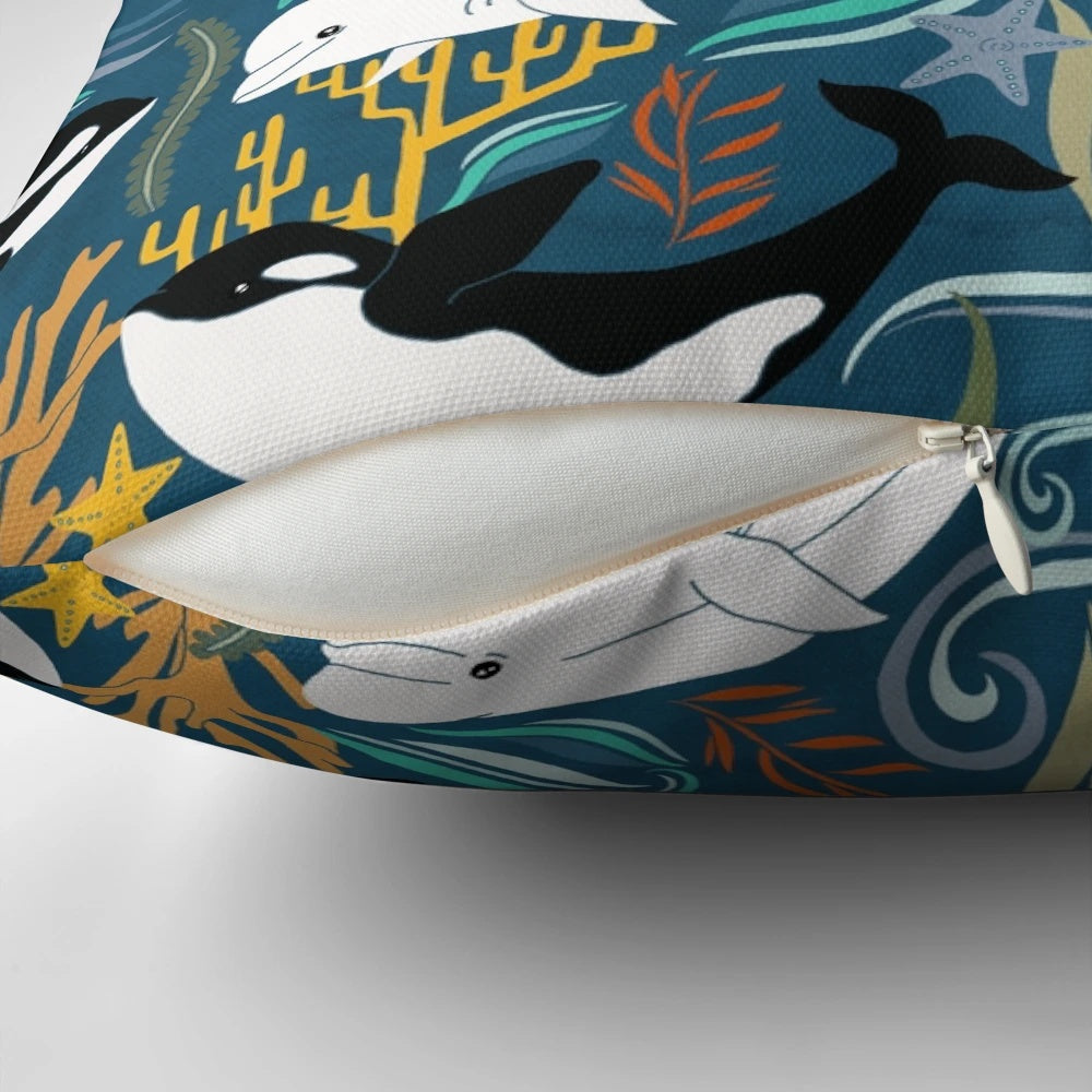 Soft, plush pillow featuring a beautiful illustration of whales swimming in the ocean