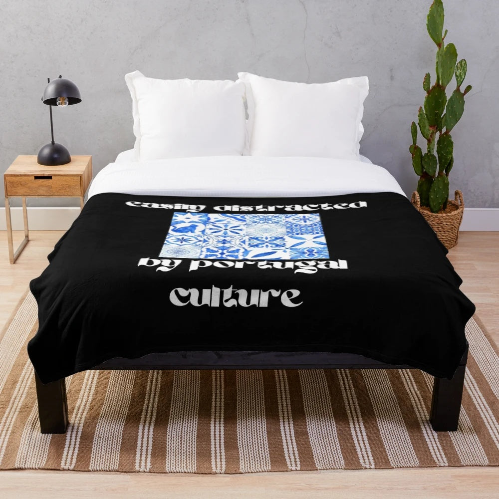Plush blanket featuring the vibrant colors and motifs of Portugal