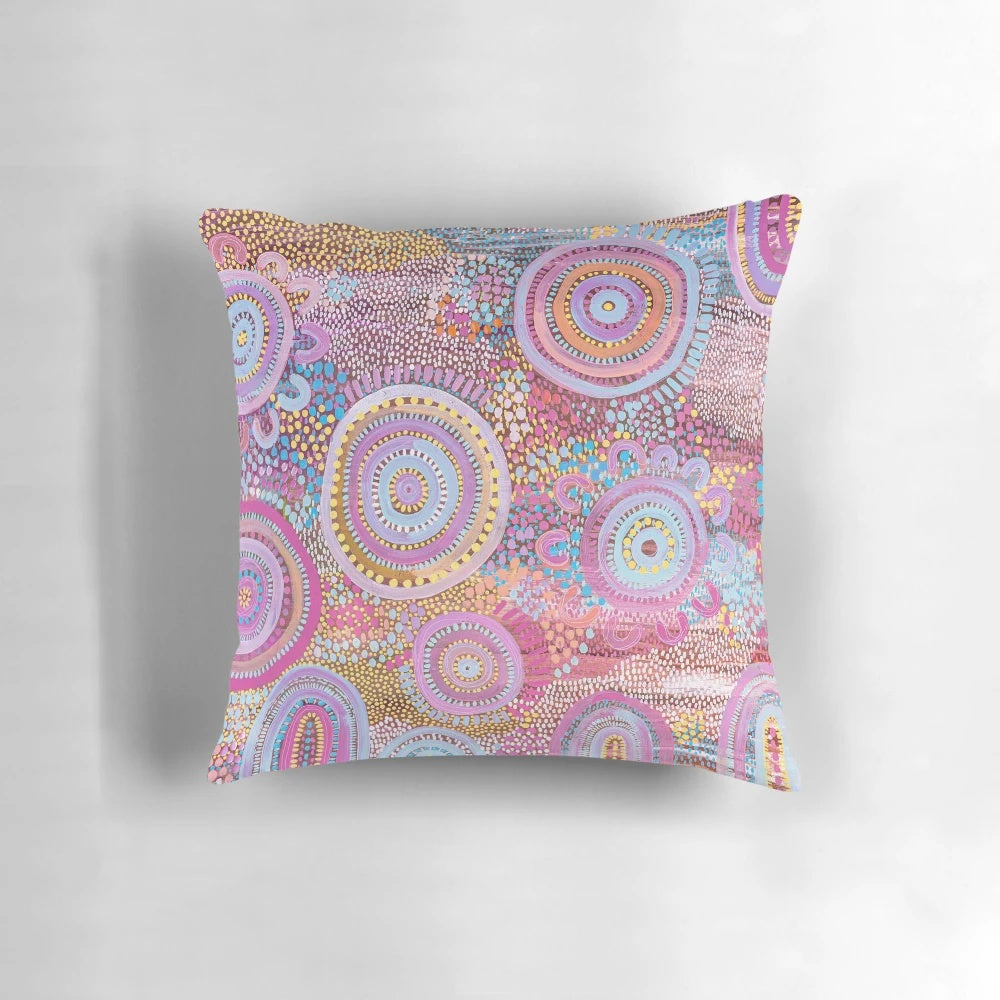 A cozy and decorative pillow featuring a seashell design, perfect for adding a touch of the beach to your home.