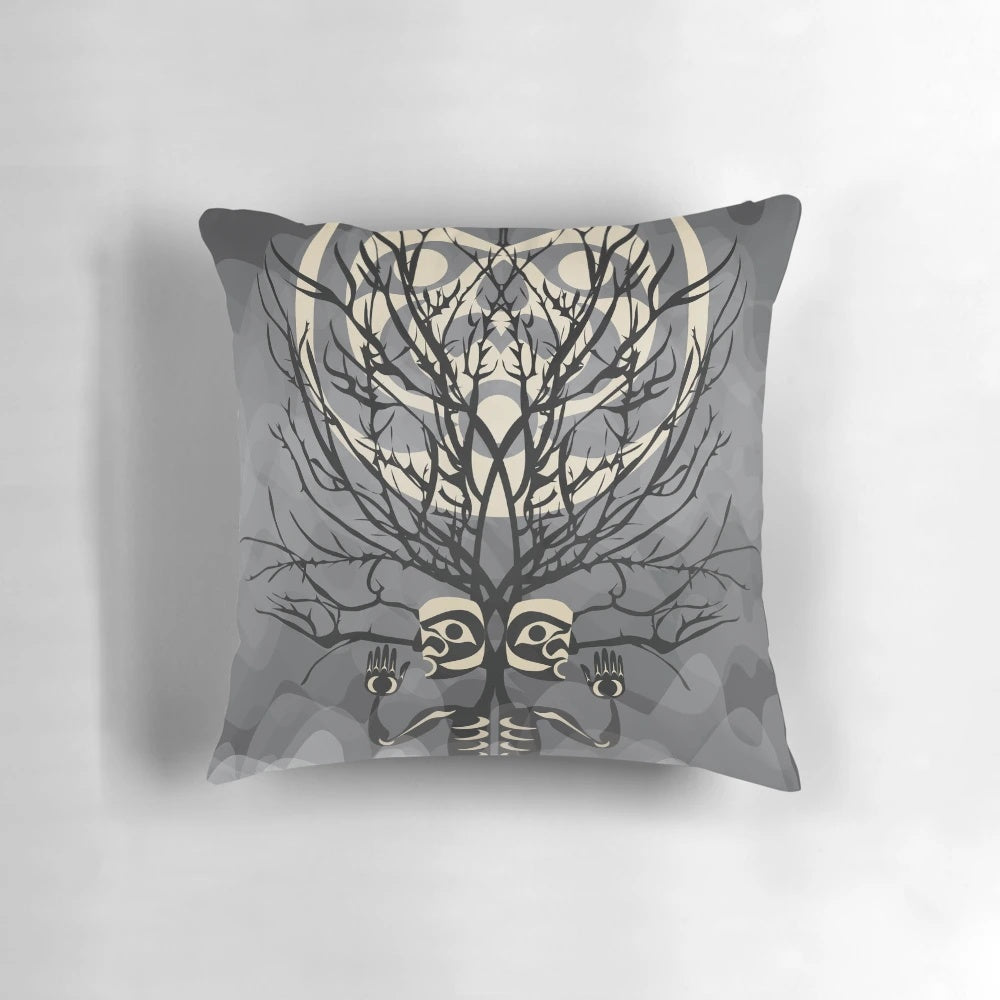 The S,ḴELÁLṈEW̱ Pillow, featuring a stunning Coast Salish tree and moon design