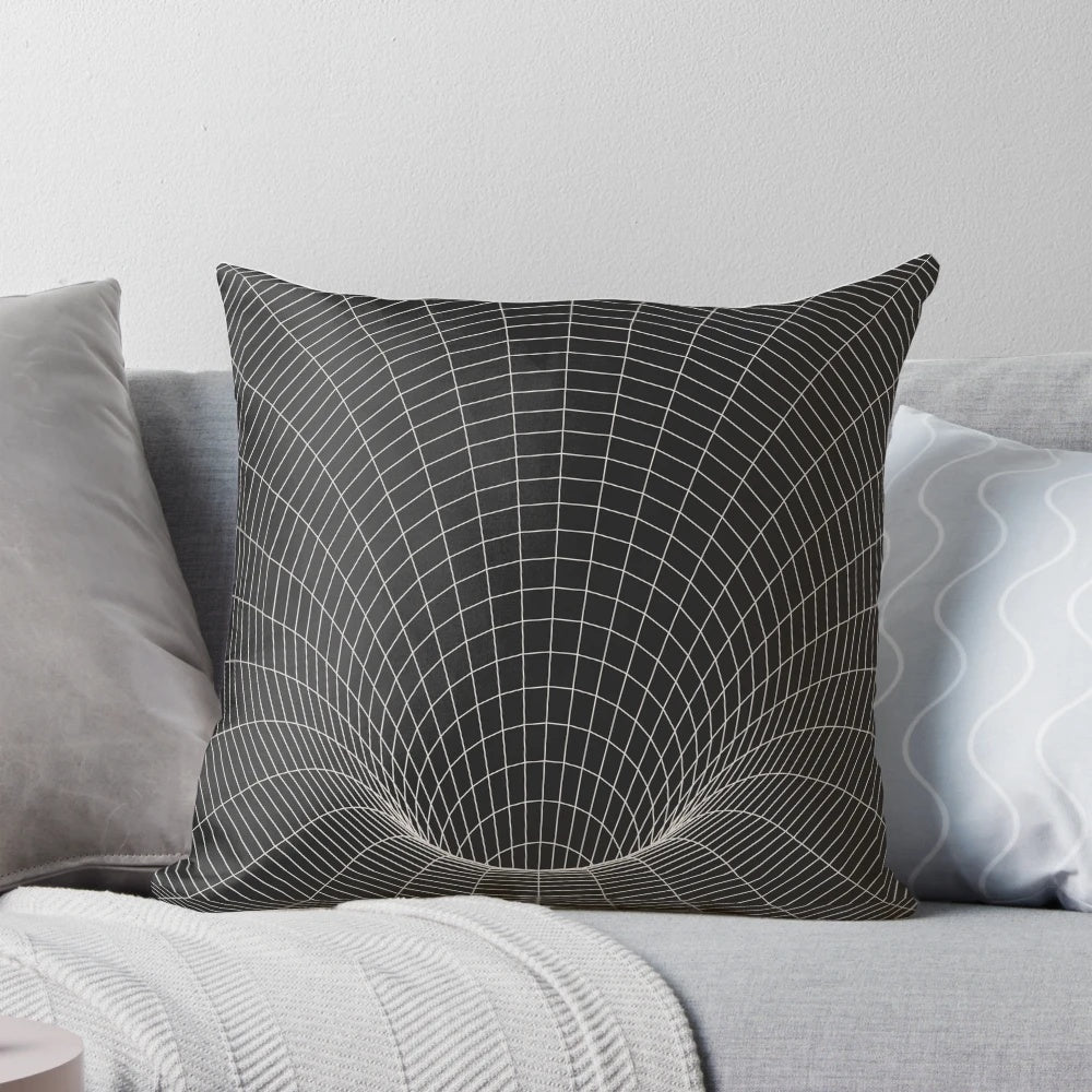Decorative space-themed pillow with a black hole and wormhole design